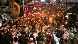 Ratusan Warga Bogor Penuhi Jalan Raya Puncak Ikut Pawai Obor Sambut Ramadan