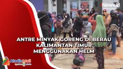 Antre Minyak Goreng di Berau Kalimantan Timur Menggunakan Helm