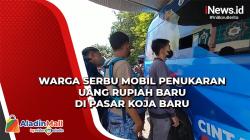 Warga Serbu Mobil Penukaran Uang Rupiah Baru di Pasar Koja Baru