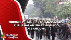 Diiringi Hujan Deras, Massa Aksi Tutup Jalan Simpang Dago di Bandung<
