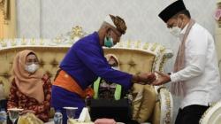 Penjabat Gubernur Gorontalo Disambut secara Adat Mopotilolo