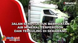 Jalan Sempit, Truk Bermuatan Air Mineral Terperosok dan Terguling di Semarang