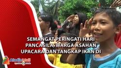 Semangat Peringati Hari Pancasila, Warga Asahan Upacara dan Tangkap Ikan di Jalan Rusak