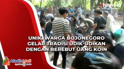 Unik, Warga Bojonegoro Gelar Tradisi Udik-udikan dengan Berebut Uang Koin
