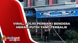 Viral, Polisi Perbaiki Bendera Merah Putih yang Terbalik