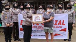 Polwan Cantik Polres Minahasa Utara Bagikan Bantuan untuk Warga Kurang Mampu