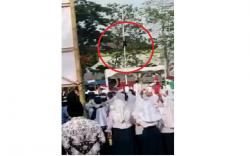Viral Aksi Heroik Satpam Puskesmas Panjat Tiang gegara Bendera Terbalik dan Tali Lepas