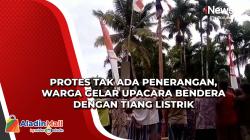Protes Tak Ada Penerangan, Warga Gelar Upacara Bendera dengan Tiang Listrik