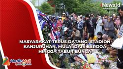 Berdoa hingga Tabur Bunga, Masyarakat Terus Datangi Stadion Kanjuruhan