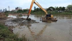 Pengerukan Lumpur Kali KBB Antisipasi Banjir Jakarta<