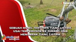 Sebuah Mobil Tertimpa Tiang Listrik Usai Terperosok ke Jurang dan Menabrak Tiang Listrik