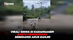 Viral! Siswa di Karangasem Bantu Pengendara Seberangi Arus Banjir