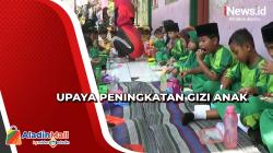 Upaya Peningkatan Gizi, Puluhan Siswa Makan Ikan Bersama di Sekolah