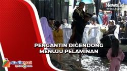 Bikin Gemas, Pengantin di Jambi Tetap Gelar Resepsi saat Banjir hingga Digendong ke Pelaminan