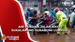 Hujan Deras Jebol Drainase, Genangan Air Lumpuhkan Jalan Raya Sukalarang-Sukabumi<