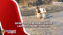 Nekat, Sejumlah Siswa SD Bertaruh Nyawa Seberangi Jalur Lahar Gunung Semeru demi Bersekolah