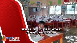 Banjir Rob di Indramayu, Siswa SD Kerjakan Ujian Semester di Atas Genangan Air<