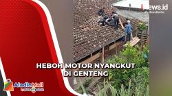Hebohkan Warga Magelang, Motor Nyangkut di Genteng Rumah