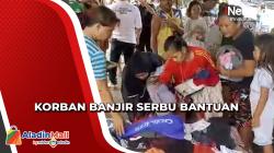 Serbu Pakaian Bekas, Warga Korban Banjir di Manado Datangi Posko TNI