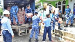 Kasau Beri Bantuan Korban Banjir di Molas-Manado<