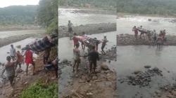 Dramatis Evakuasi Ibu hamil Seberangi Sungai Cirompang di Bungbulang Garut<