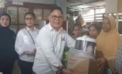 Partai Perindo Beri Bantuan Pelaku UMKM Terdampak Banjir di Manado