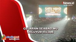 Ribuan Nahdliyin Tetap Bertahan meski Resepsi Puncak Satu Abad NU Diguyur Hujan Deras