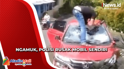 Heboh, Aksi  Polisi Ngamuk dan Rusak Mobil Milik Sendiri