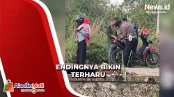 Bikin Terharu, Ini Momen Polisi Bantu Belikan Bensin ke Pasutri yang Dorong Motor