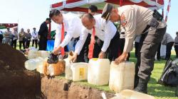 Polres Kotamobagu Musnahkan Barang Bukti Miras dan Knalpot Bising<