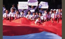  Ratusan Siswa SD di Solo Aksi Dukung Timnas Indonesia U-22: Jangan Lepas Medali Emas!