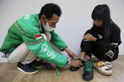 Ribuan Anak Mitra Pengemudi Rayakan Hari Anak Nasional dengan Sepatu Berdesain Khusus Gratis dari Grab