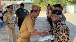 Serahkan Sertifikat Tanah Program PTSL, Bupati Tanah Laut: Gunakan dengan Bijak 
