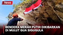 Momen Bendera Merah Putih Raksasa Dikibarkan di Mulut Gua Sigugula Bogor