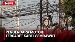 Pengendara Motor dan Anaknya Jatuh Tersabet Kabel Semrawut di Jakarta Barat