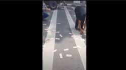 Viral Uang Belasan Juta Berhamburan di Jalanan Kota Medan