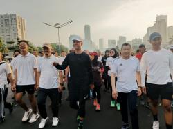 Dampingi Ganjar Pranowo CFD, Siti Atikoh Antusias Lari Pagi di Sudirman