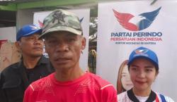 Dapat KTA Asuransi dan Minyak Goreng dari Perindo, Ketua RT di Depok: Insya Allah Bisa Jalankan Amanah