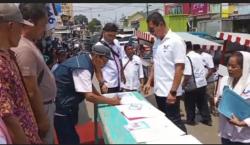 Pelaku UMKM di Pasar Rawalo Banyumas Semringah Dapat Bantuan Gerobak Perindo