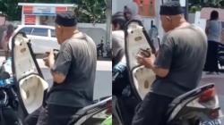 Nyeleneh, Pria Ini Ikut Antre Panjang di SPBU Sambil Makan Siang