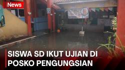 Siswa SD Jalani Ujian di Pengungsian akibat Luapan Sungai Citarum