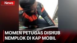  Viral! Petugas Dishub DKI Nemplok di Kap Mobil, Ini Klarifikasinya 