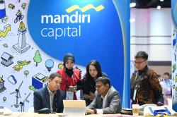 Tuntaskan Program Xponent di Money 20/20 Asia, MCI Siap Jajaki Pasar Regional dan Global 