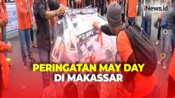 May Day, Ratusan Buruh Turun ke Jalan dan Bakar Papan Tuntutan di Makassar