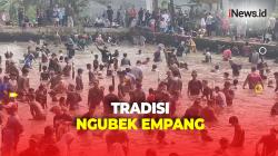 Melihat Keseruan Ribuan Warga Depok Berebut Tangkap Ikan dalam Tradisi Ngubek Empang