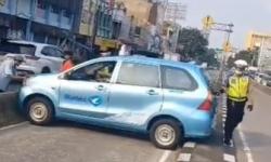 Hindari Polisi, Viral Taksi Melintang Terjebak di Jalur Busway hingga Bikin Macet