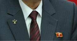 Baru! Pejabat Korut Kenakan Pin Bergambar Kim Jong Un saat Rapat, Kultus Pemimpin Makin Kuat?