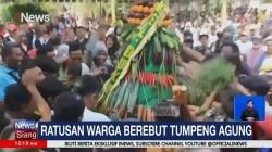 Ratusan Warga Berdesakan Berebut Gunungan Hasil Bumi di Surabaya