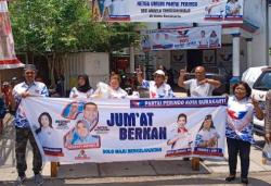 Jumat Berkah, Partai Perindo Solo Sosialisasikan Respati-Astrid dengan Bagikan Makanan<
