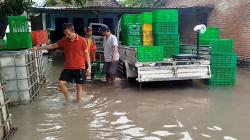 Banjir di Mojokerto Disebabkan Luapan Sungai Setelah Diguyur Hujan Deras<